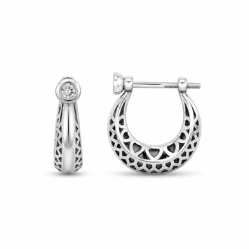 Silver hoop earrings with intricate designs on a white background