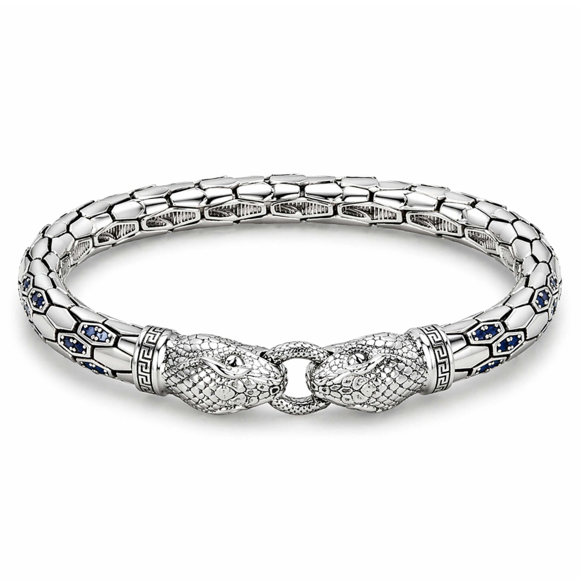 Silver bracelet with blue gemstones on a white background