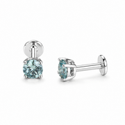 Pair of silver stud earrings with light blue gemstones on a white background