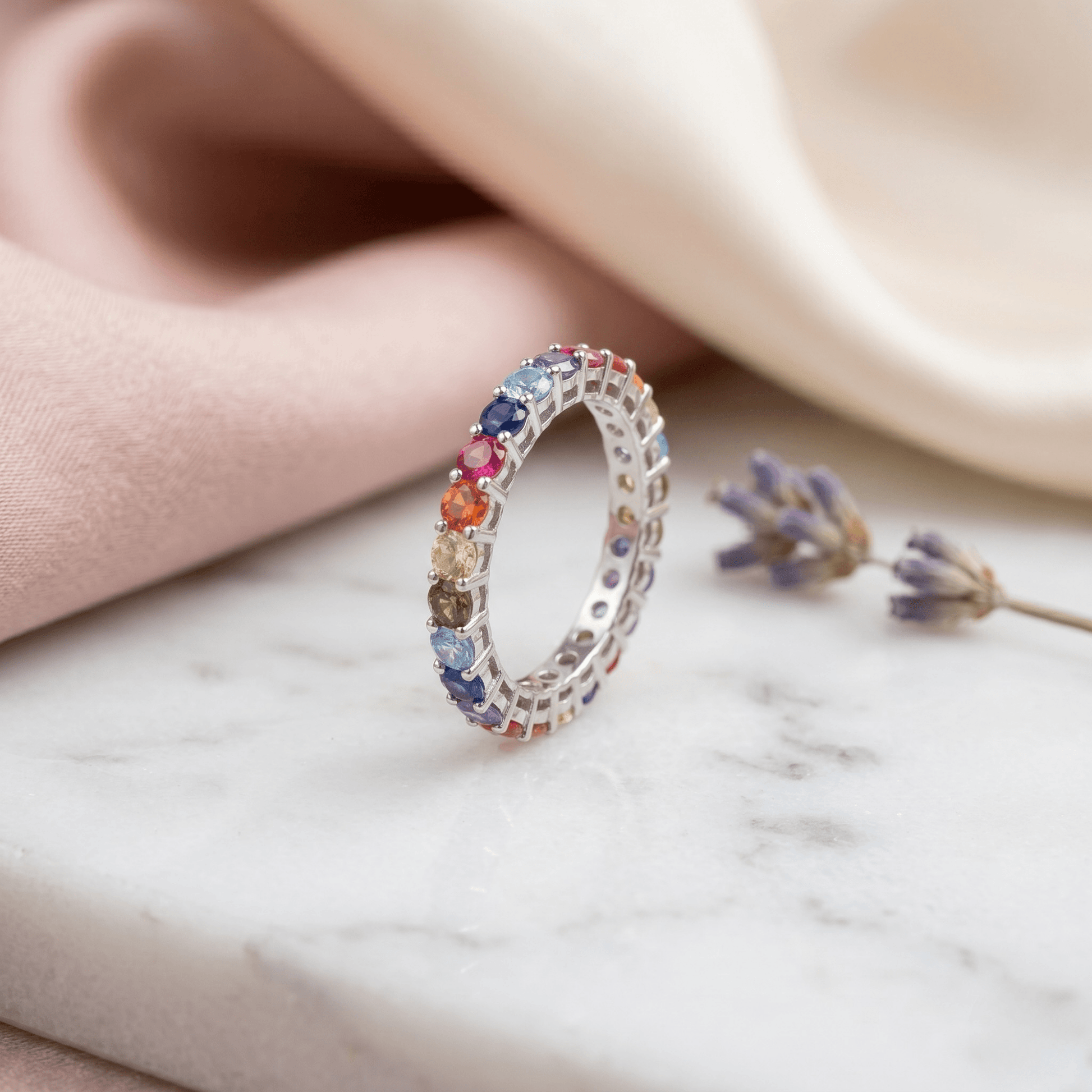 Rainbow eternity band ring in 925 silver — angle view