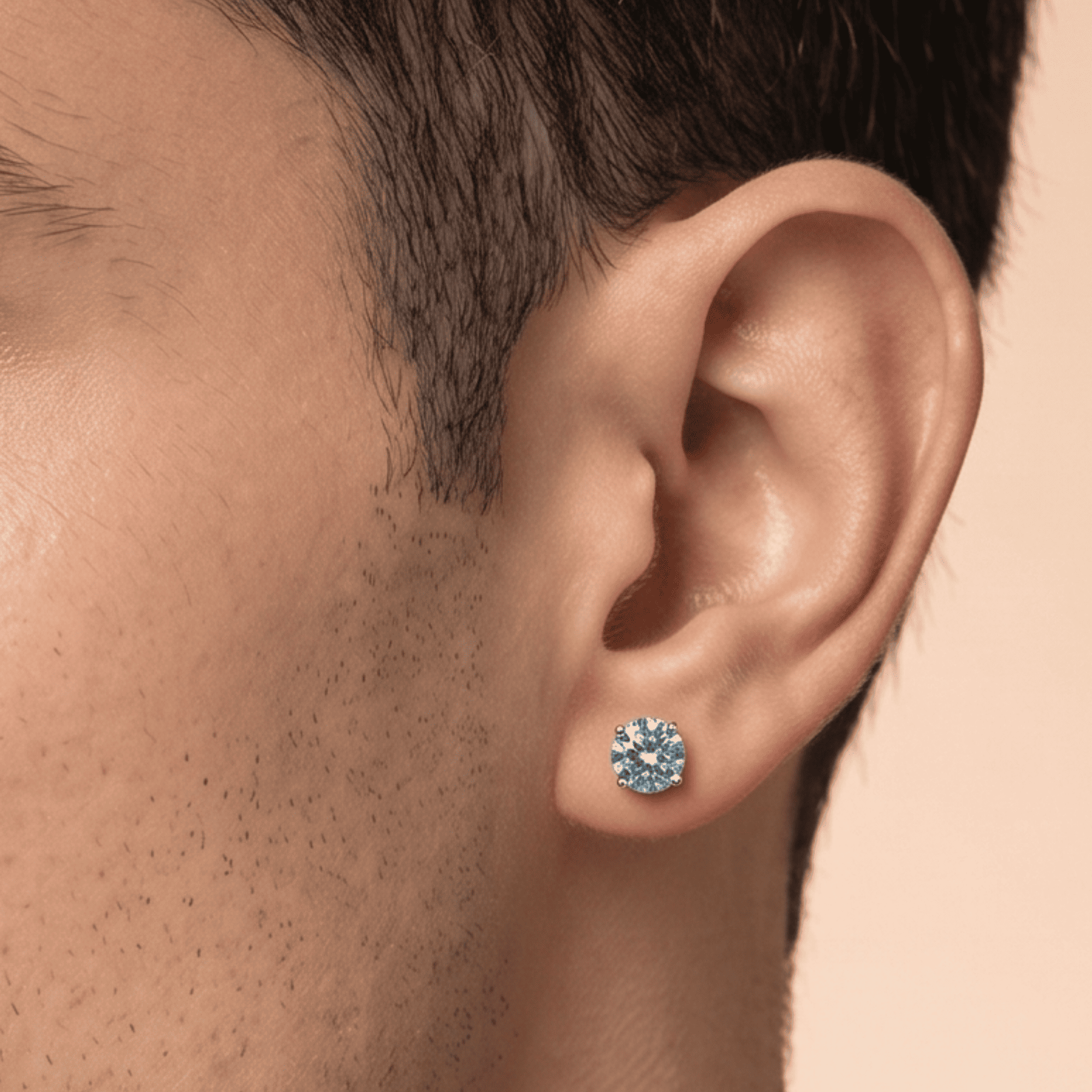 Blue moissanite stud earrings in 925 silver — detail view