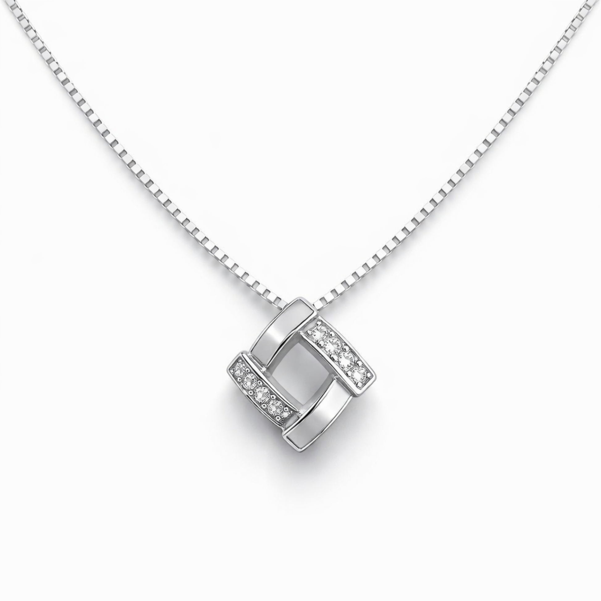 Silver necklace with a square pendant on a white background
