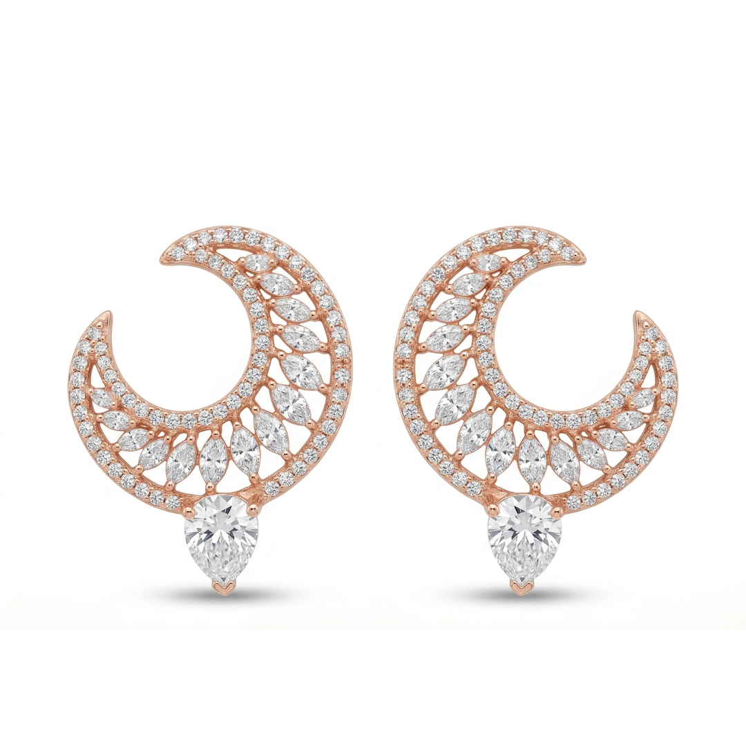 Rose gold and diamond earrings on a white background